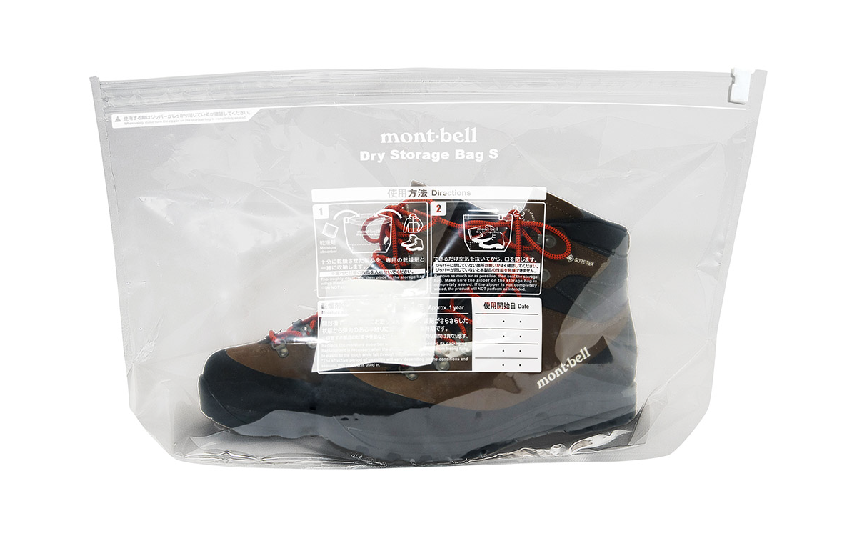 A depiction of hiking boots stored in a dry storage bag.