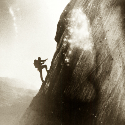 Isamu Tatsuno during a pendulum traverse on the Hinterstoisser Traverse of the Eiger North Face in 1969.