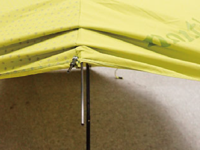 Yellow umbrella before repair: Broken rib tip.
