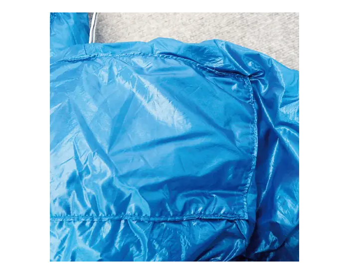 Sleeping bag after repair: Patched with matching fabric.