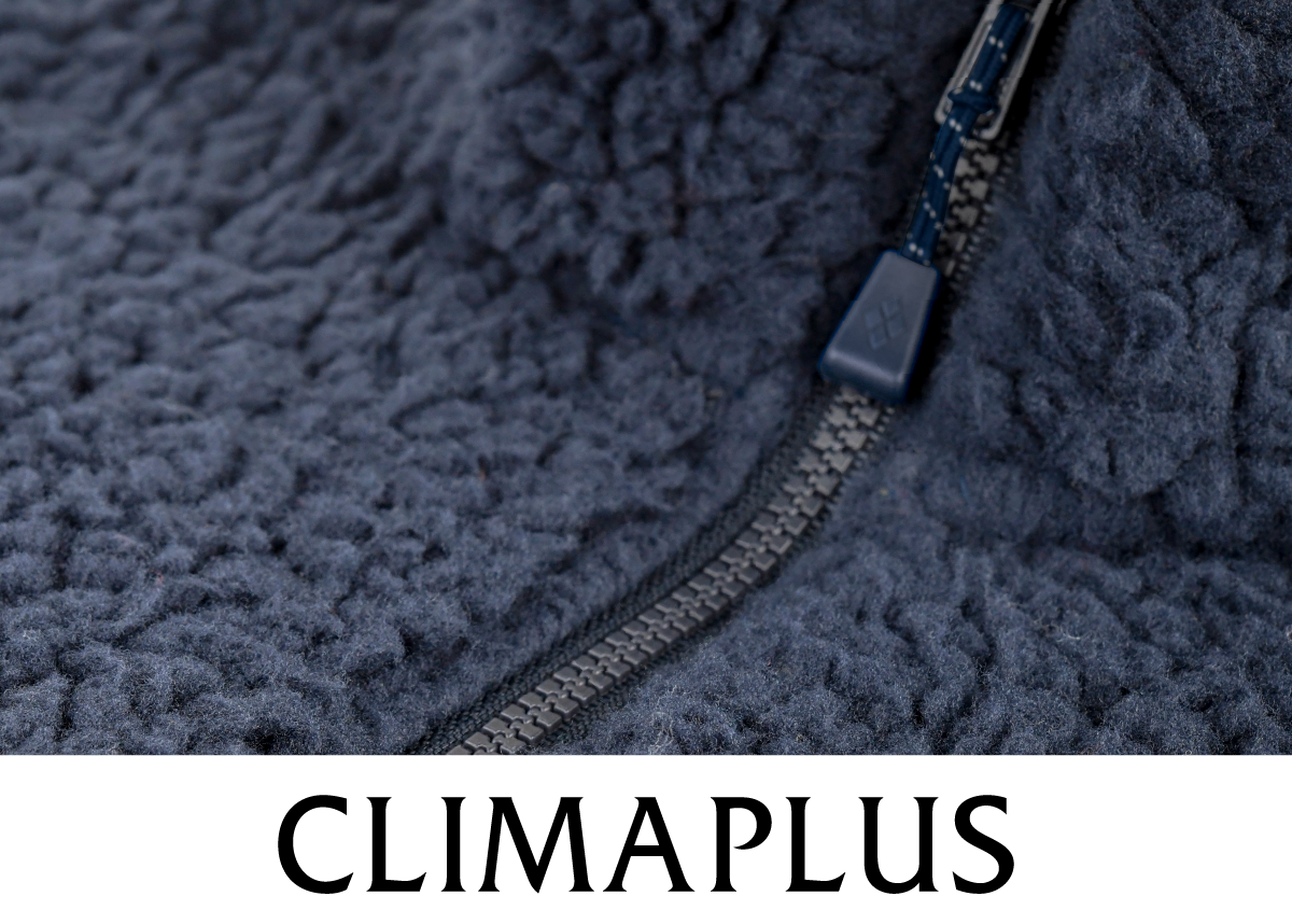 A photograph focusing on the fabric with the CLIMAPLUS logo