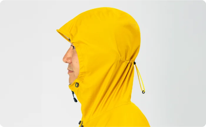 An illustration showing how to wear and adjust the hood.  The explanation follows later.