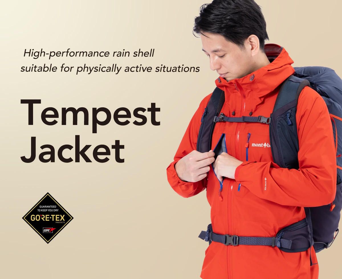 Image of wearing Tempest Jacket with the chest pocket open, High-performance rain shell suitable for physically active situations