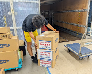 Loading relief supplies onto a truck