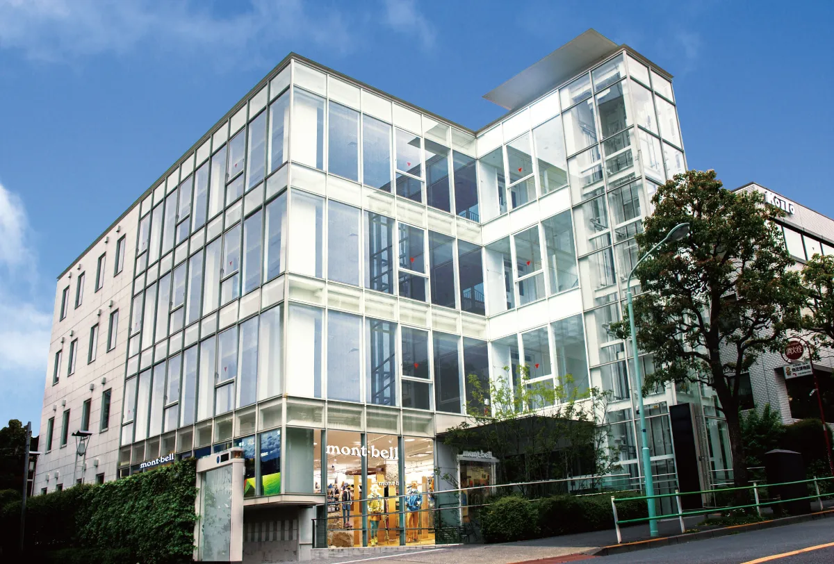 Exterior view of the Tokyo office. A 4-story building with white exterior walls.