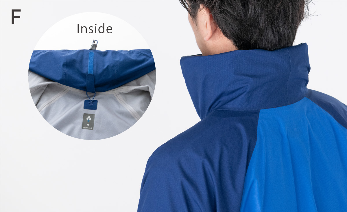A close-up view of the collar. There is a loop on the inside of the collar of the jacket, and when stored, the hood part becomes like the collar of the jacket.