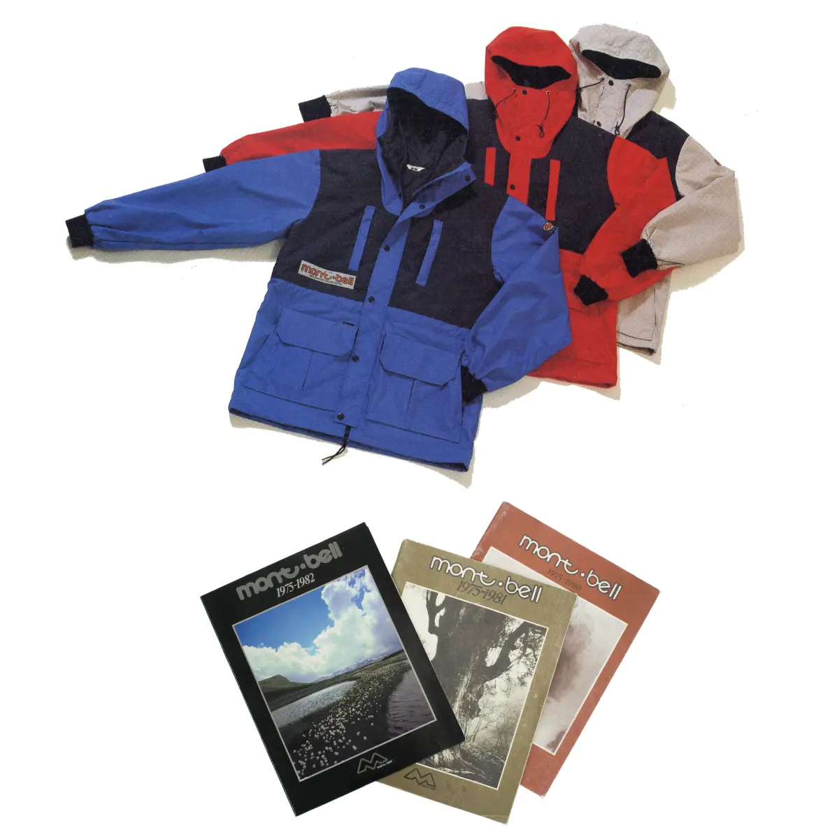 Three Alpine jackets "Super Dru Parka" using Thinsulate in blue, red, and gray lined up; three Montbell catalogs from that time arranged together