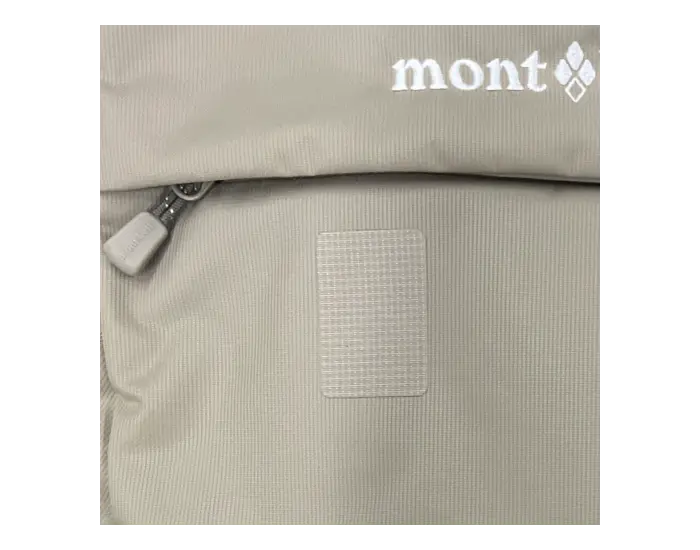 Backpack after repair: A patch using original fabric is applied