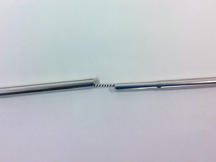 Tent pole after repair: Replaced with new pole.