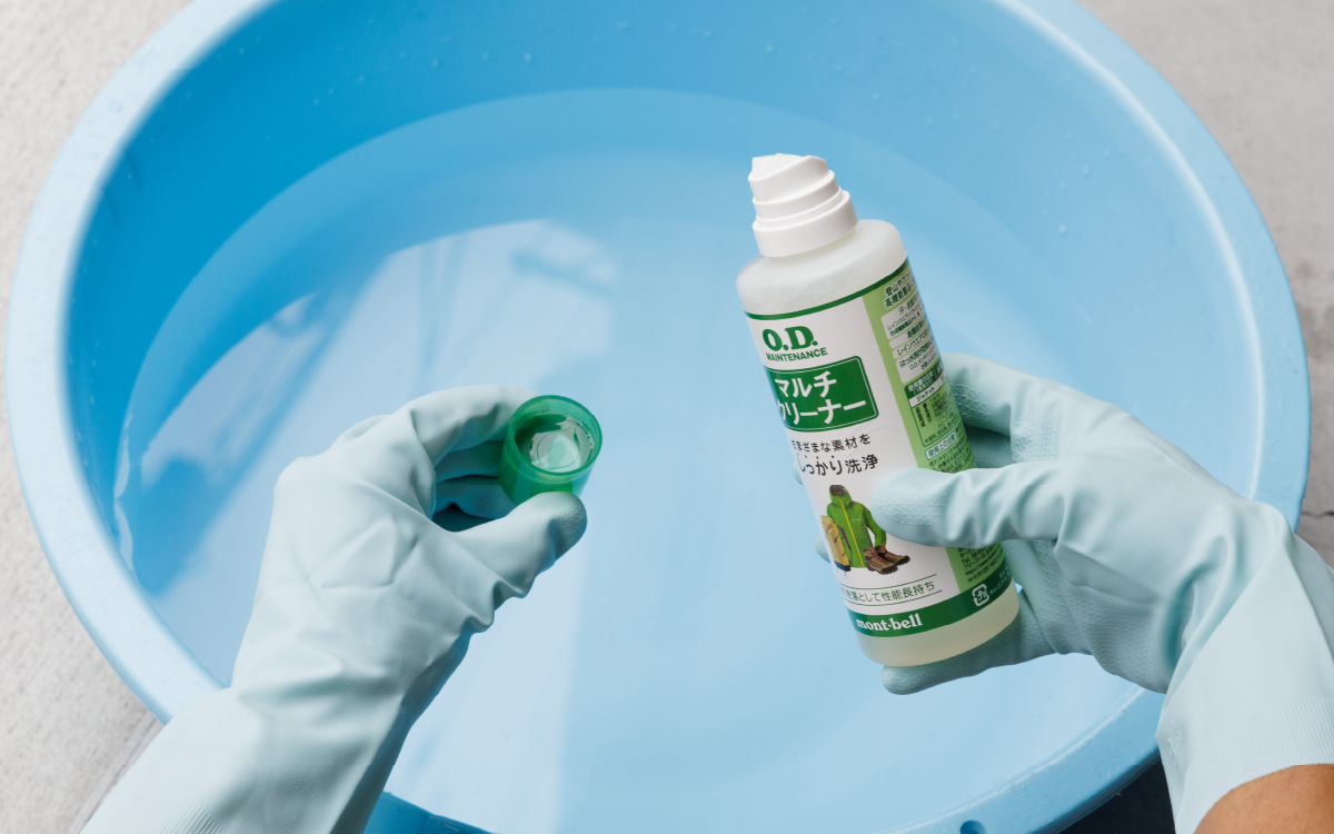 Pouring cleaning solution into the wash basin