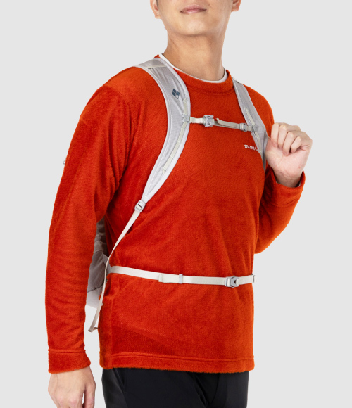 Shown here being worn. The model is carrying a backpack and wearing the CLIMAAIR Light T-shirt.