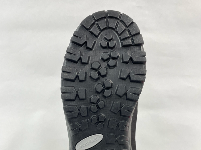 Hiking boot outsole after repair: Outsole completely replaced.