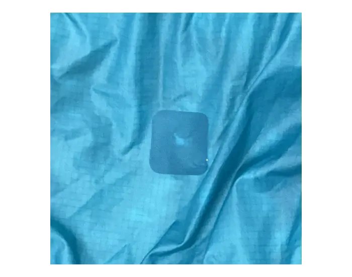 Sleeping bag after repair: A patch using original fabric is applied