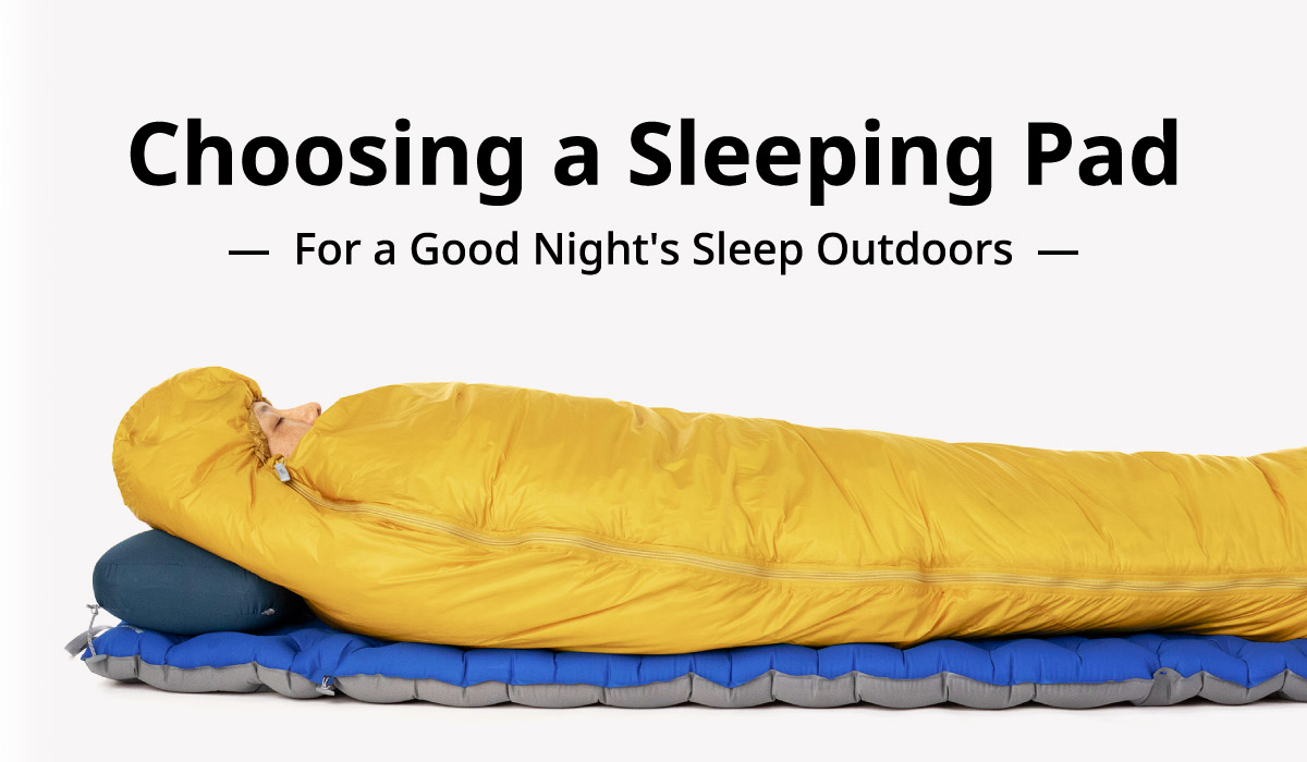 Choosing a Sleeping Pad. For a Good Night's Sleep Outdoors. Image of sleeping using a sleeping bag, sleeping pad, and pillow.