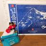 Grindelwald store original bandanas, pouches, key chains, and trekking bells